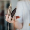 efelidi-tre-fili particolare rocchetti del telaio utilizzati per la tessitura manuale